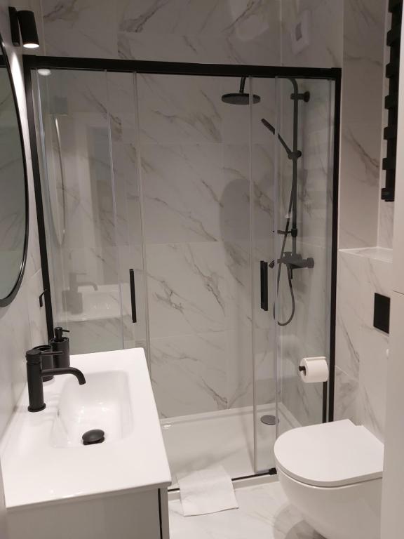 Kúpeľňa v ubytovaní Apartament 150 Zaspa VVita