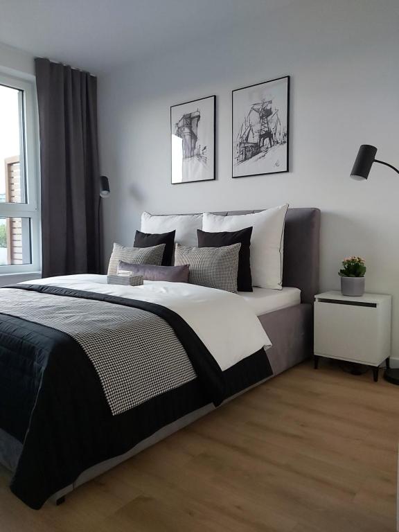 Posteľ alebo postele v izbe v ubytovaní Apartament 150 Zaspa VVita