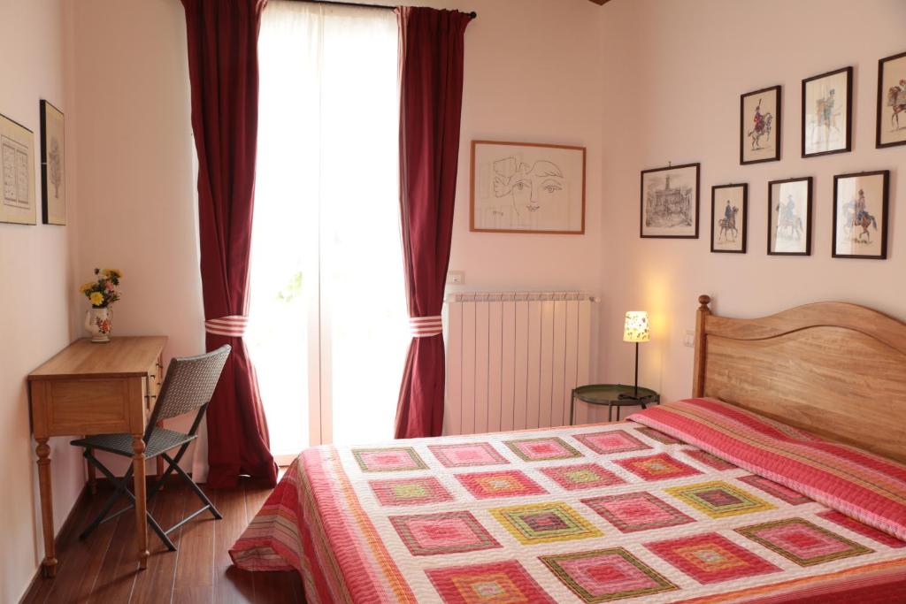 Łóżko lub łóżka w pokoju w obiekcie Agriturismo Terra dei Falchi