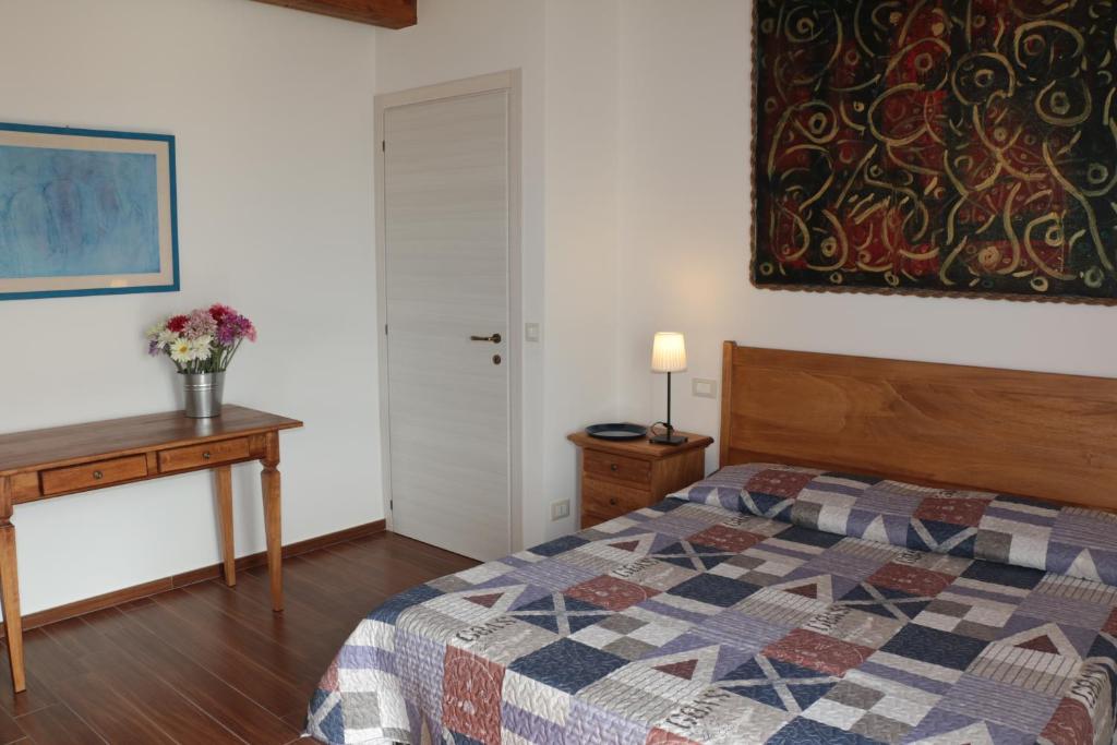 Łóżko lub łóżka w pokoju w obiekcie Agriturismo Terra dei Falchi