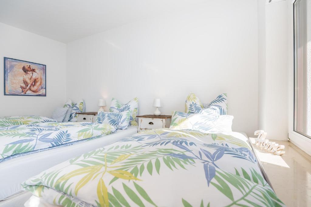 Postel nebo postele na pokoji v ubytování DARFATI 4-Zimmer Wohnung