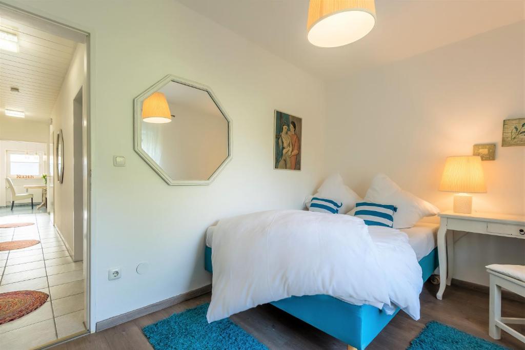 Postel nebo postele na pokoji v ubytování DARFATI 4-Zimmer Wohnung