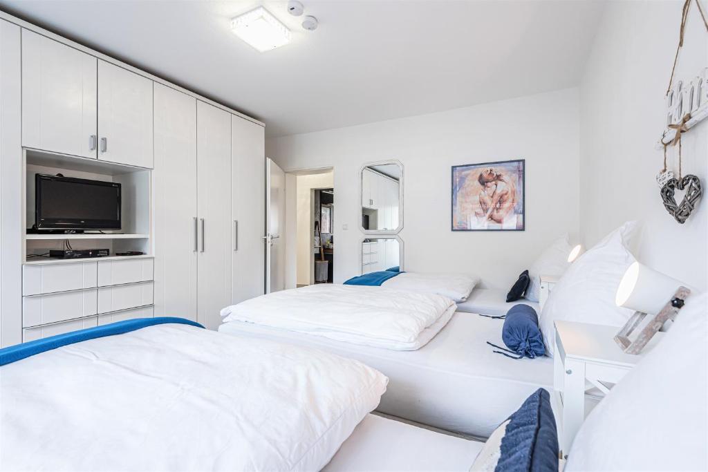 Postel nebo postele na pokoji v ubytování DARFATI 4-Zimmer Wohnung