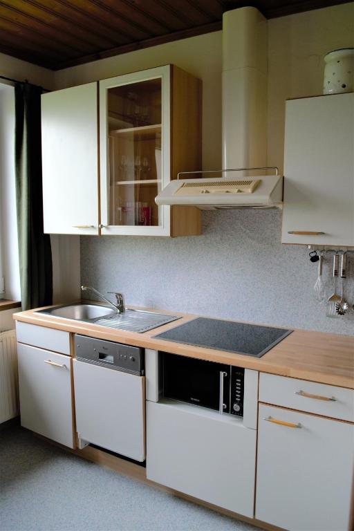 Kuchyň nebo kuchyňský kout v ubytování Appartementhaus Sunshine