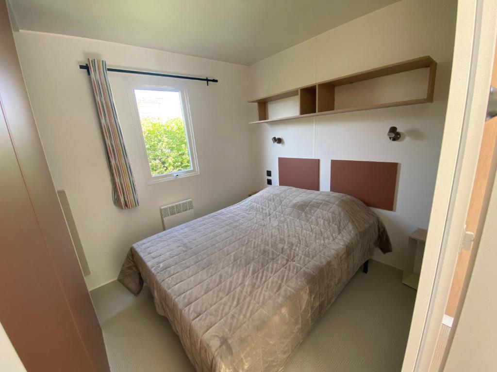 Postel nebo postele na pokoji v ubytování Camping Le Tarteron