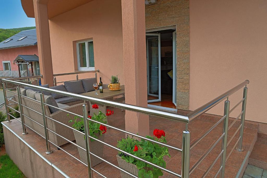 Balkón nebo terasa v ubytování Holiday House Lana