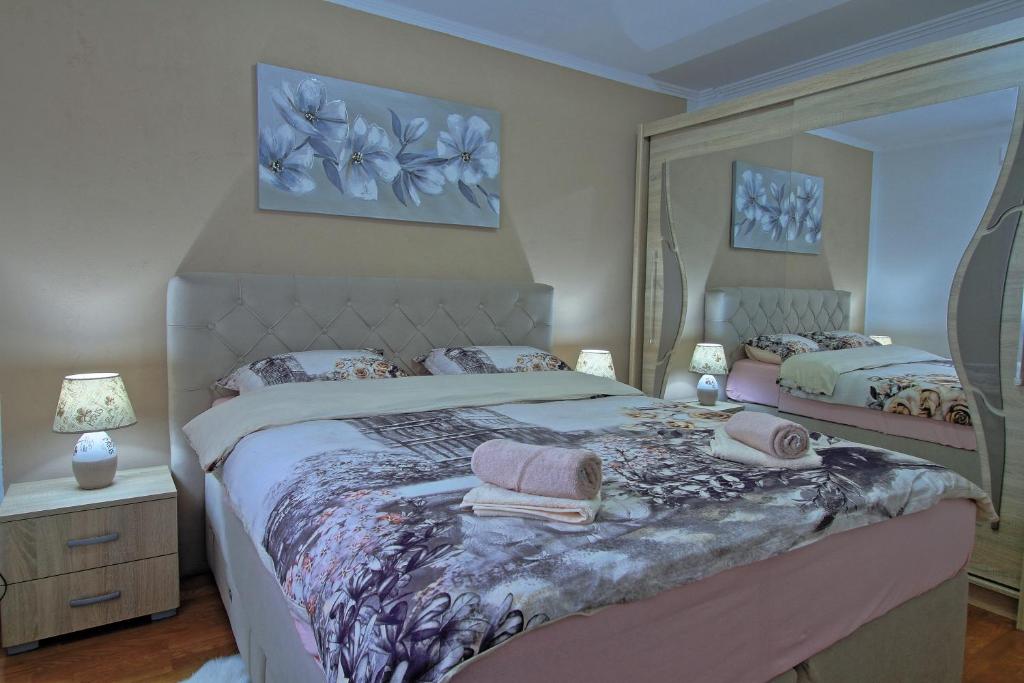 Postel nebo postele na pokoji v ubytování Holiday House Lana