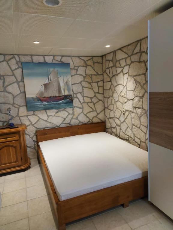 Postel nebo postele na pokoji v ubytování Studio apartment Jelinek