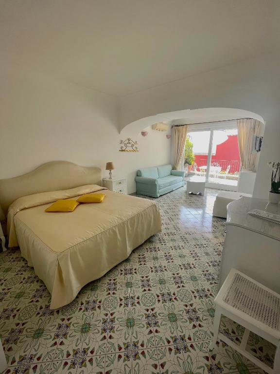 Postel nebo postele na pokoji v ubytování Villa Rosa