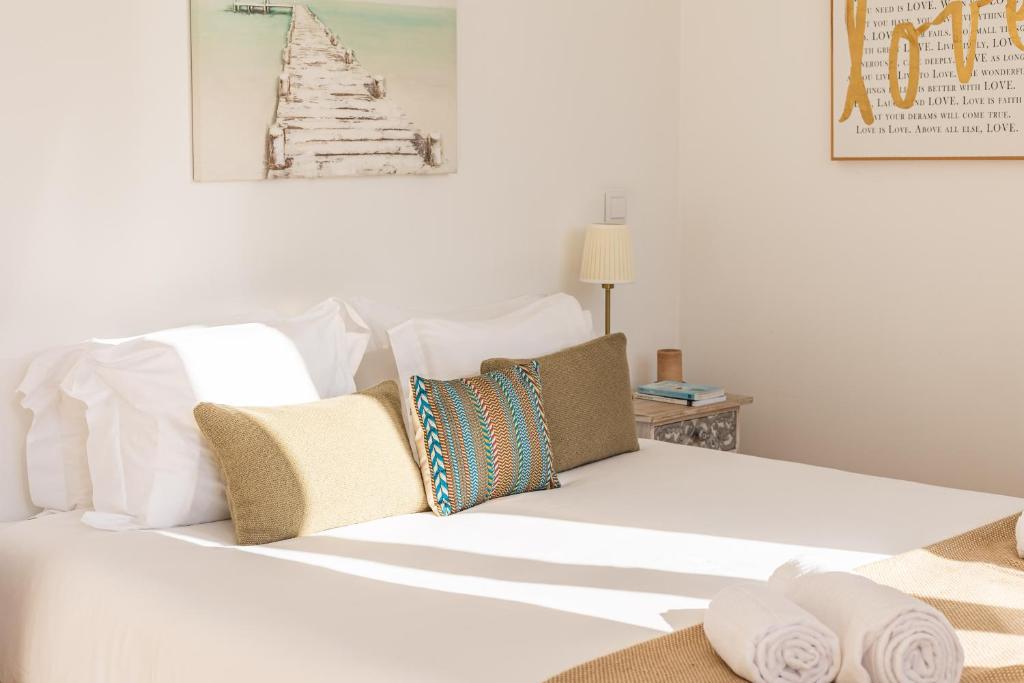 Katil atau katil-katil dalam bilik di Bright Tailor Made Flat With a View in Estrela