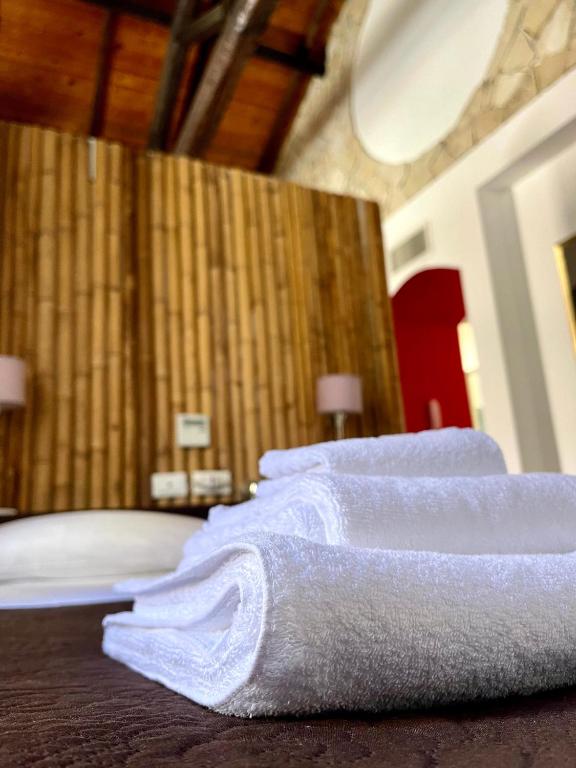 Letto o letti in una camera di Le Torri