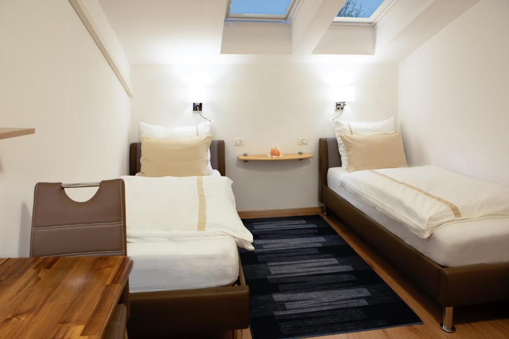 Postel nebo postele na pokoji v ubytování Rooms Gril