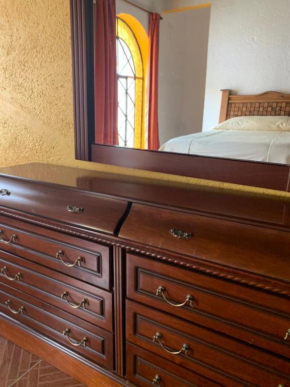 Postel nebo postele na pokoji v ubytování Hotel La Condesa