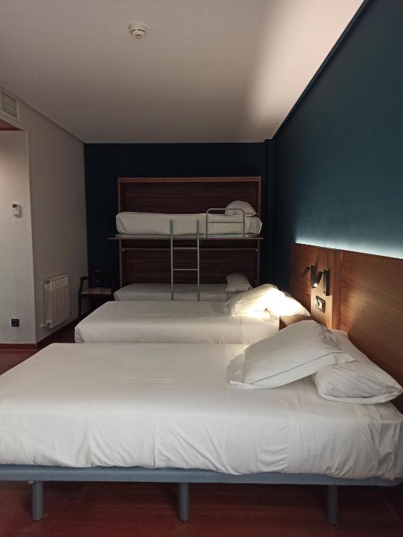 Postel nebo postele na pokoji v ubytování ARVA Spa París