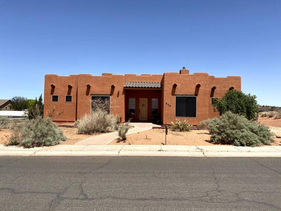 a brick building in the middle of a desert at Spacious Home in Page