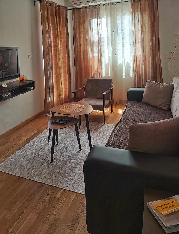 TV a/nebo společenská místnost v ubytování Apartman Miss T