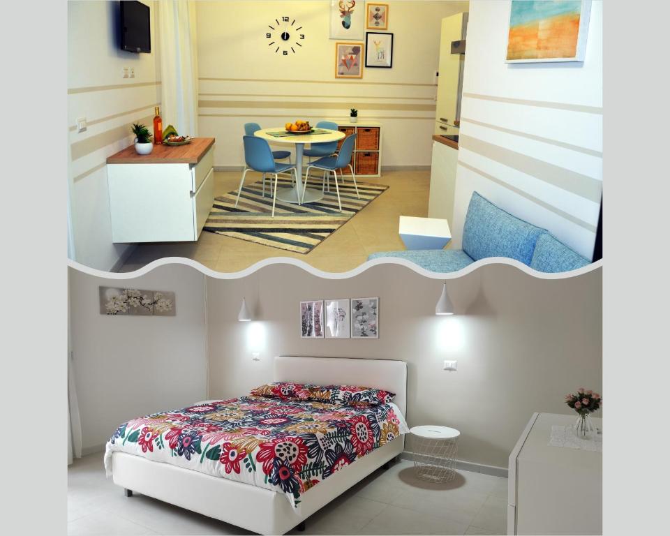 um pequeno quarto com uma cama e uma mesa em Zenzero e Limone em Catânia