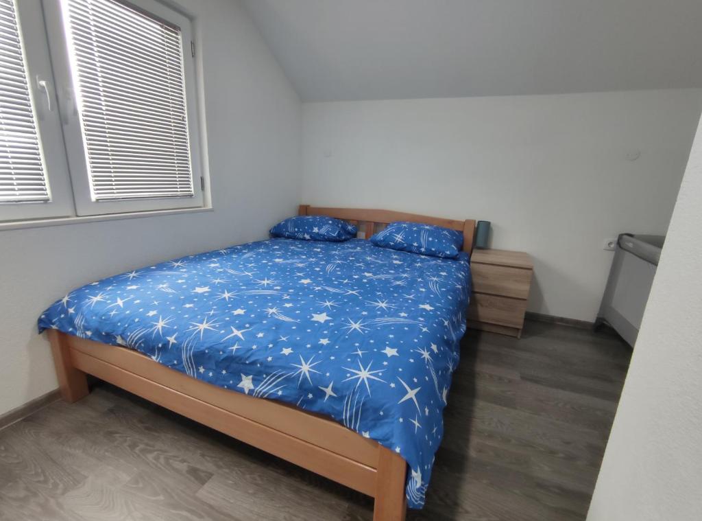 Postel nebo postele na pokoji v ubytování Apartman Amina-Ahmad Vinac-Jajce