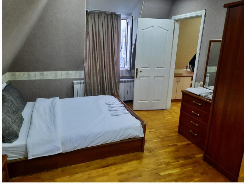 Llit o llits en una habitació de apartament Nizami mool