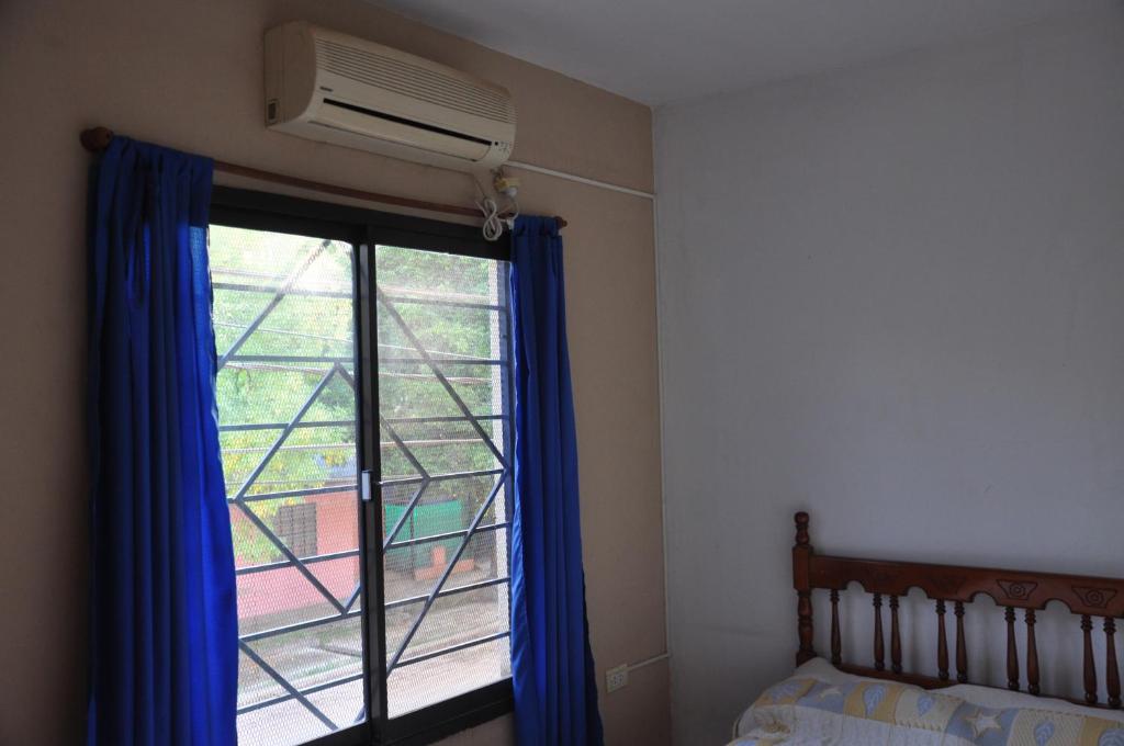 Ένα ή περισσότερα κρεβάτια σε δωμάτιο στο Bungalows Nepen