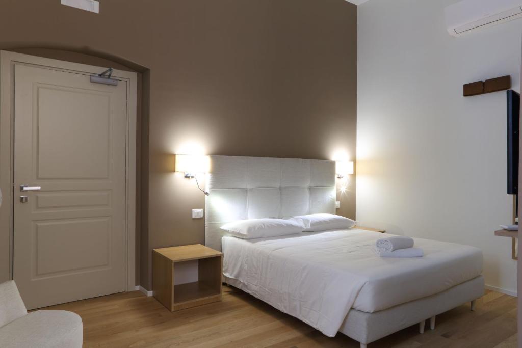 Posteľ alebo postele v izbe v ubytovaní B&B Castanea