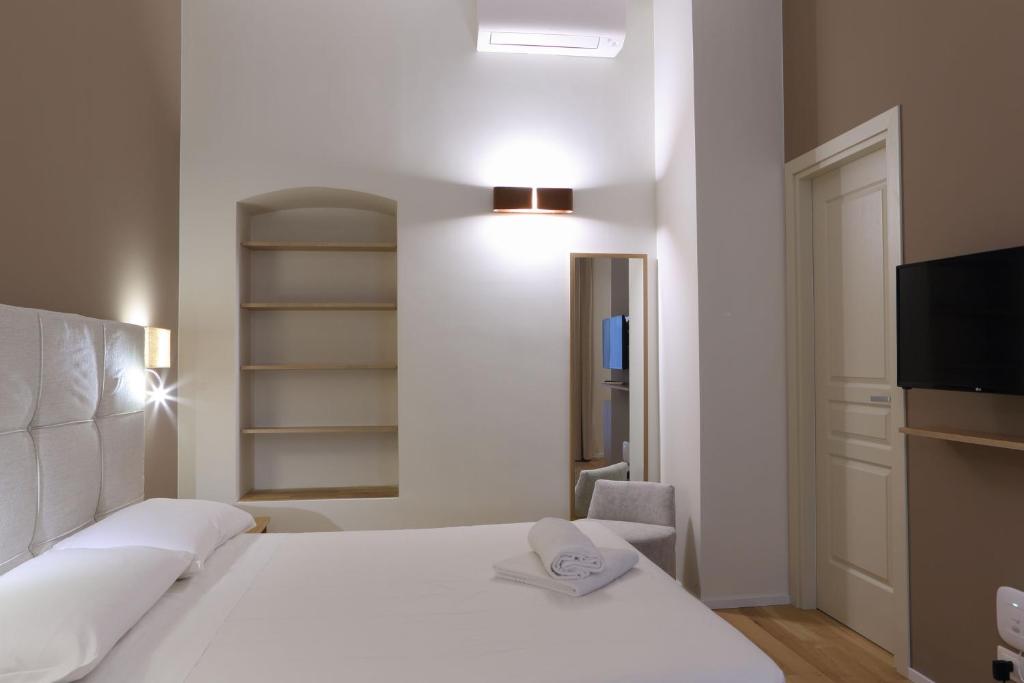 Posteľ alebo postele v izbe v ubytovaní B&B Castanea