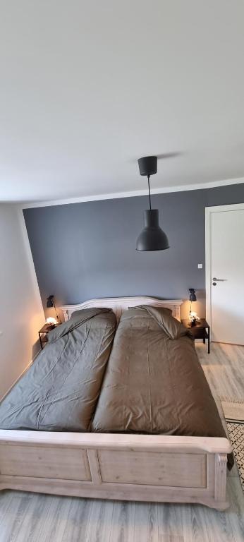Postel nebo postele na pokoji v ubytování Storebælt Apartament