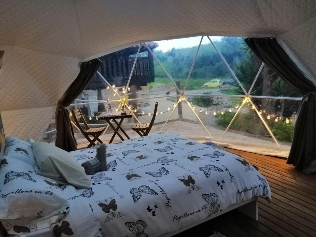 Postel nebo postele na pokoji v ubytování Glamping Quintana
