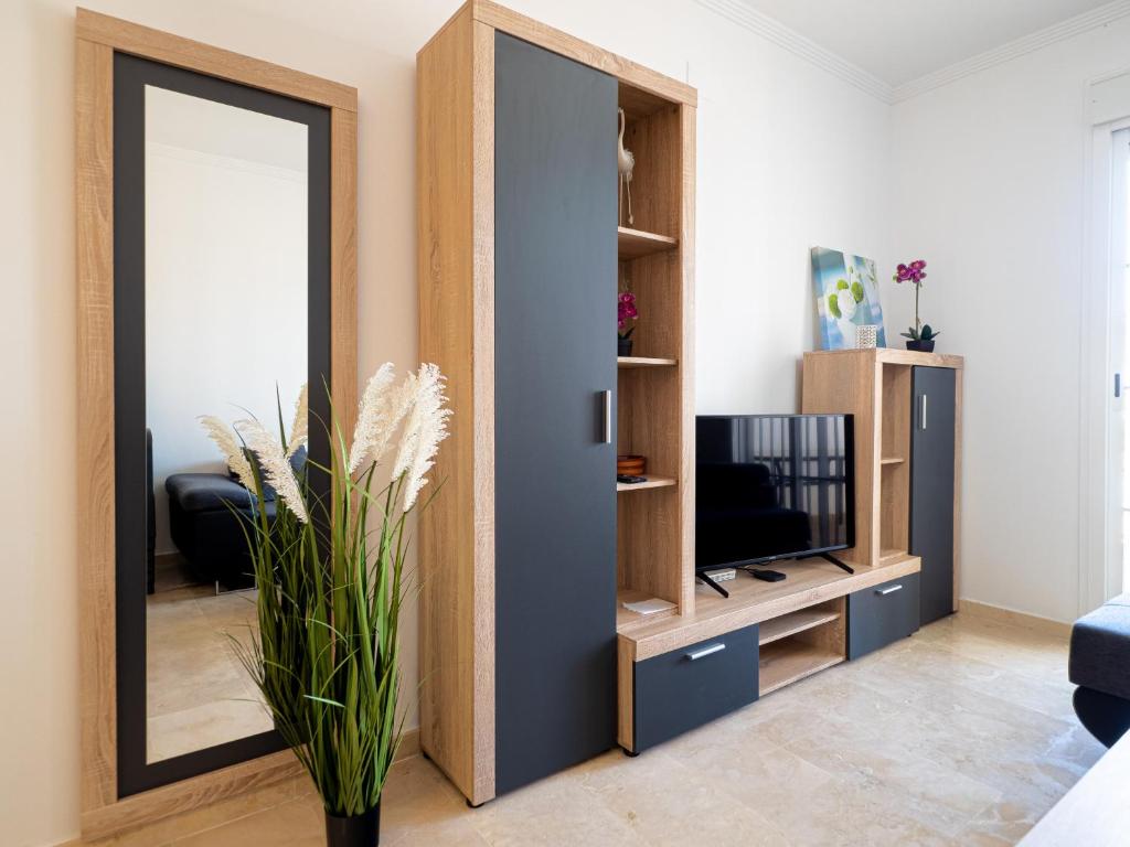 TV a/nebo společenská místnost v ubytování Small Oasis 2368 Sea & Sun