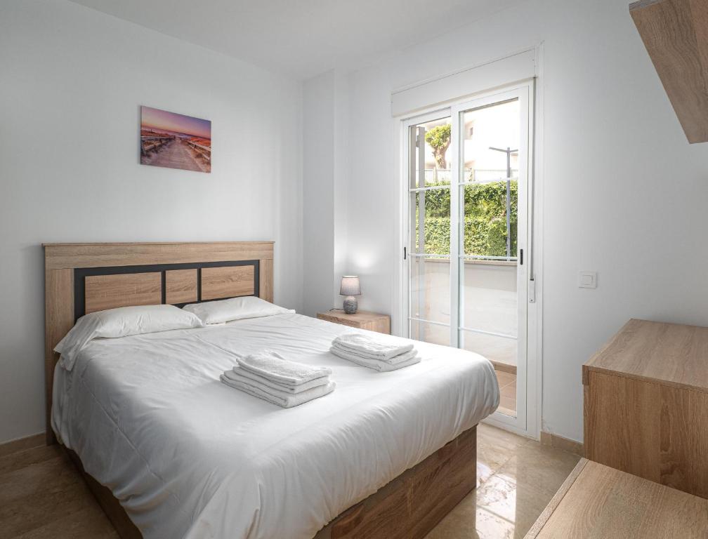 Postel nebo postele na pokoji v ubytování Small Oasis 2368 Sea & Sun