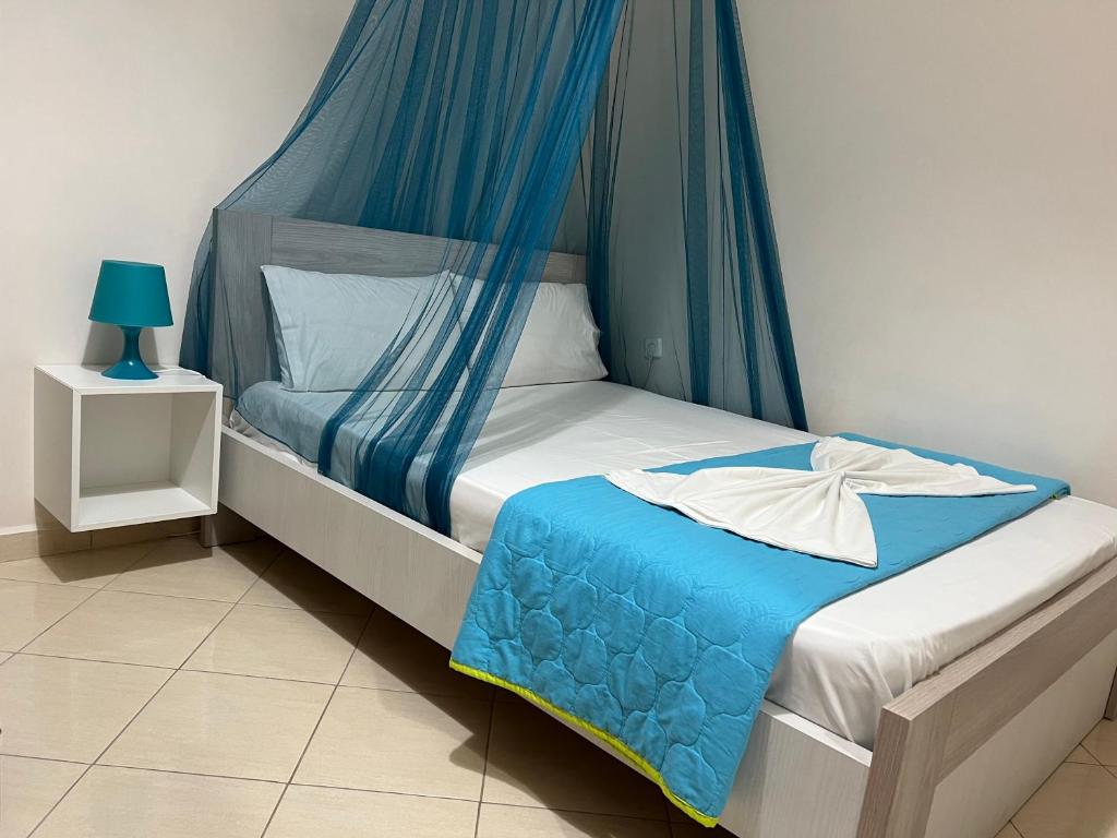 Postel nebo postele na pokoji v ubytování Apartment Katherina Sarande