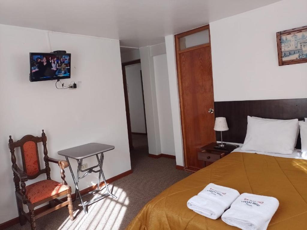 TV a/nebo společenská místnost v ubytování Pukara House