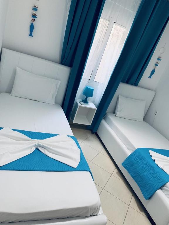 Postel nebo postele na pokoji v ubytování Apartment Katherina Sarande