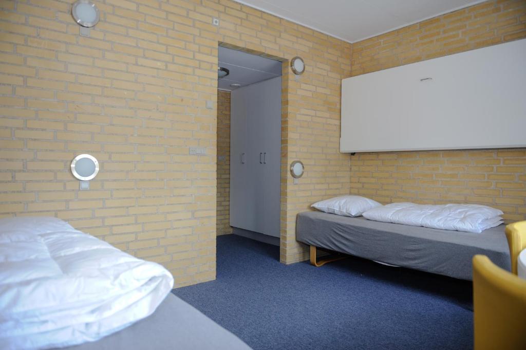 Voodi või voodid majutusasutuse Idrætscenter Jammerbugt toas