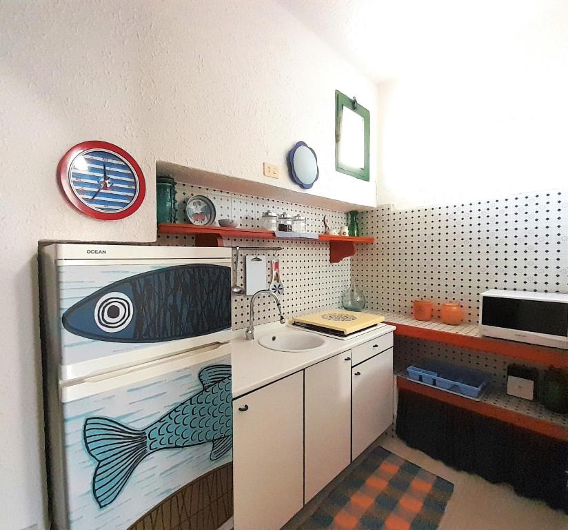 Kuchyňa alebo kuchynka v ubytovaní Casa Flavin Favignana