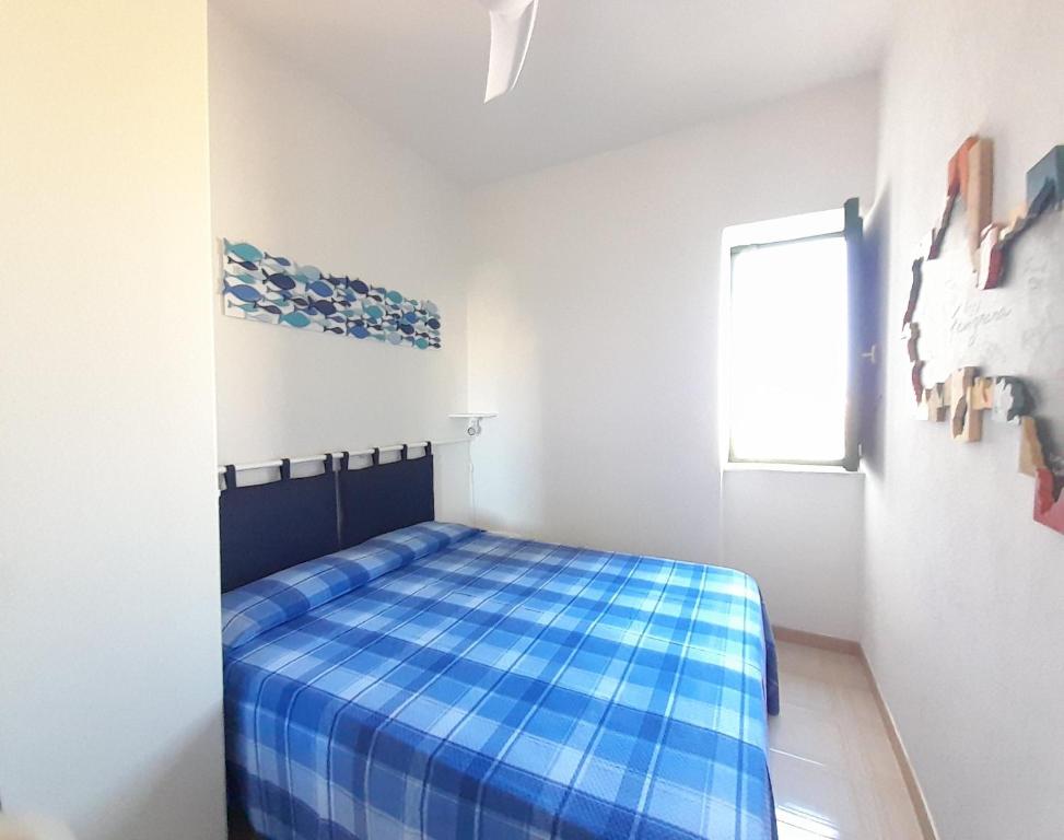 Posteľ alebo postele v izbe v ubytovaní Casa Flavin Favignana