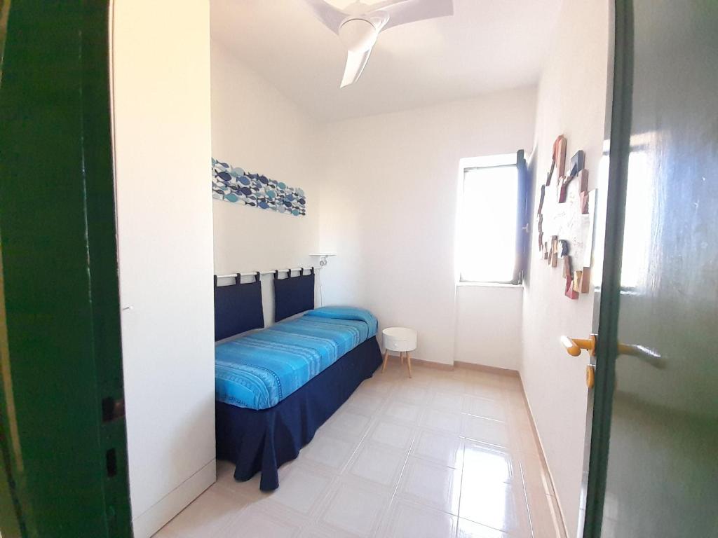 Posteľ alebo postele v izbe v ubytovaní Casa Flavin Favignana