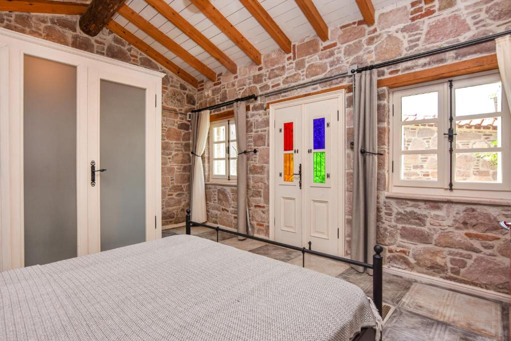 Postel nebo postele na pokoji v ubytování Lunaria Guest House