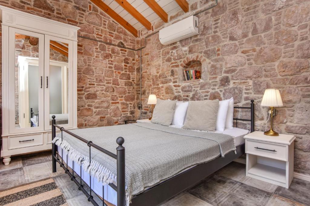 Postel nebo postele na pokoji v ubytování Lunaria Guest House