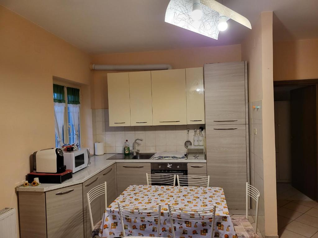 Kuchyňa alebo kuchynka v ubytovaní Fiumicino beach