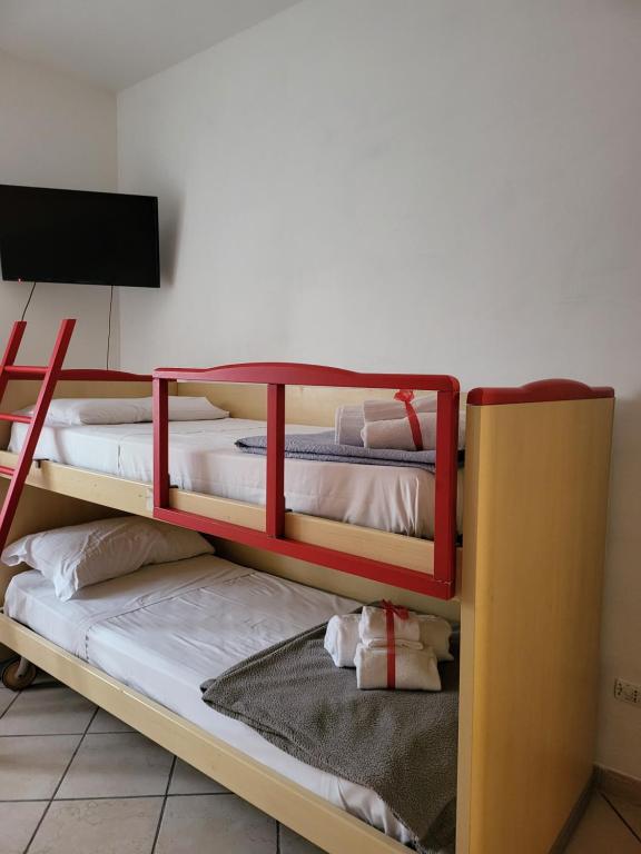 Posteľ alebo postele v izbe v ubytovaní Fiumicino beach