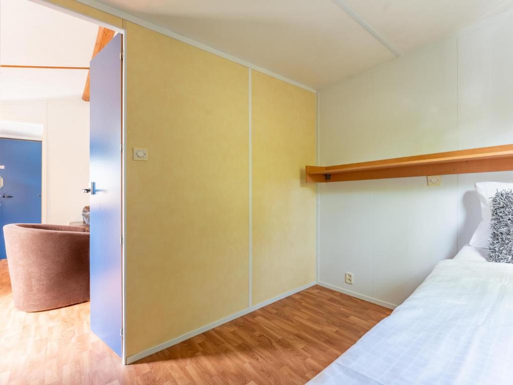 Postel nebo postele na pokoji v ubytování De Buizerd