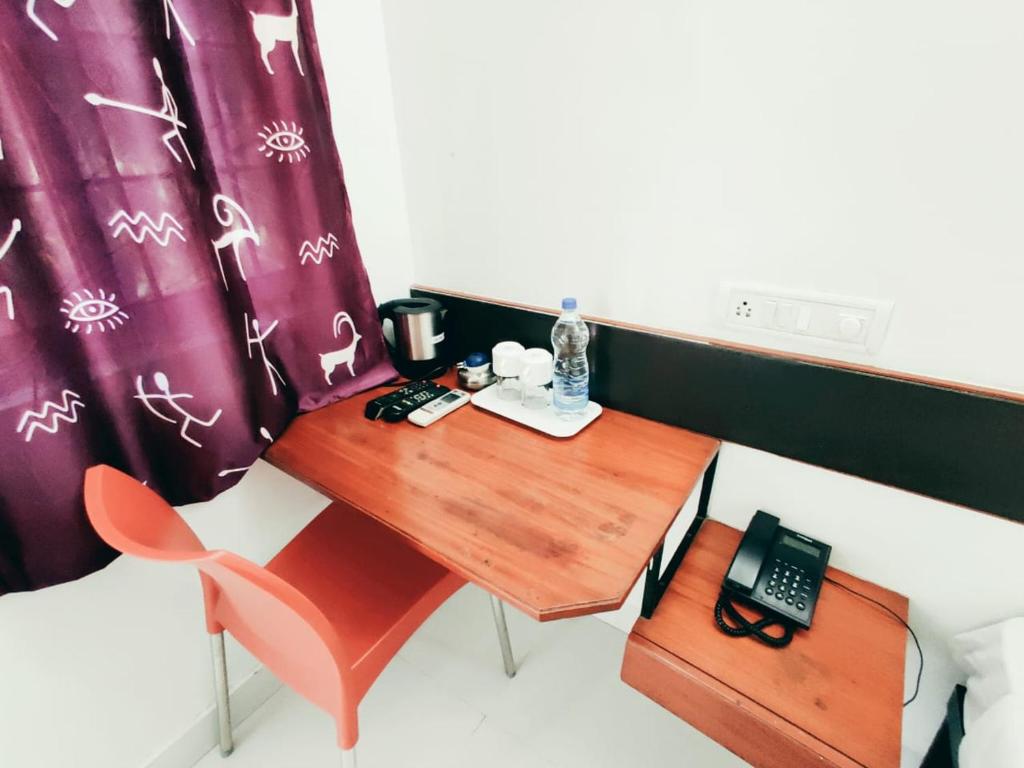 Posezení v ubytování Raccoon Rooms