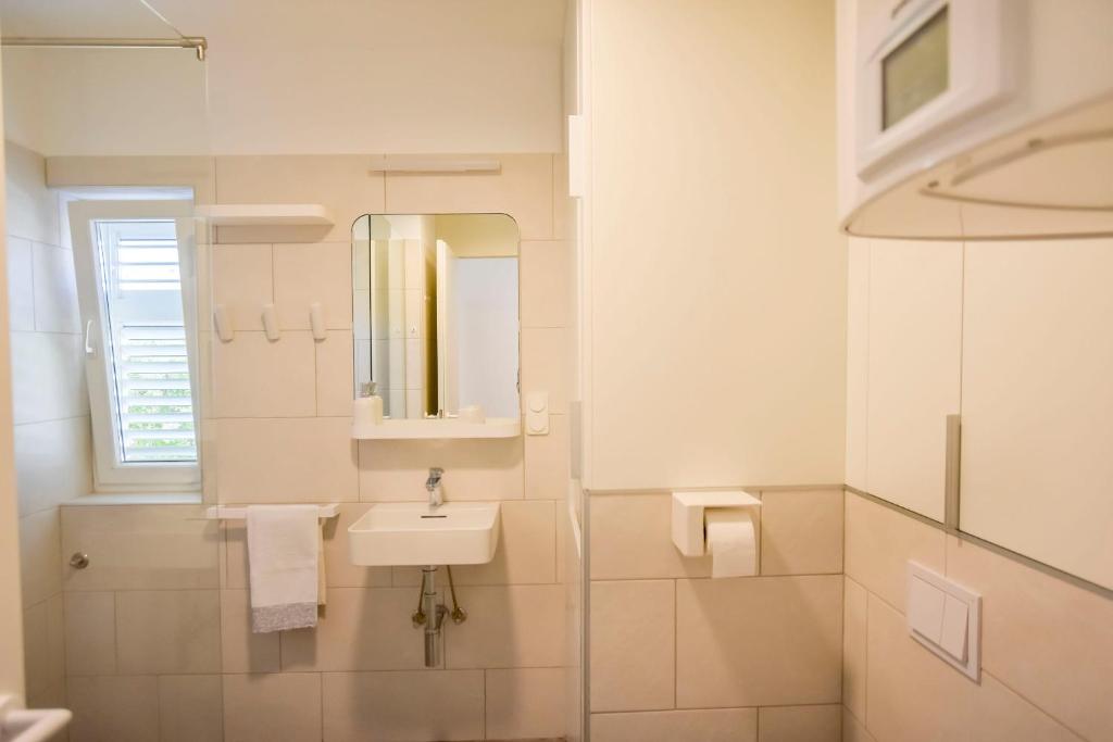 Koupelna v ubytování Apartment Filomena