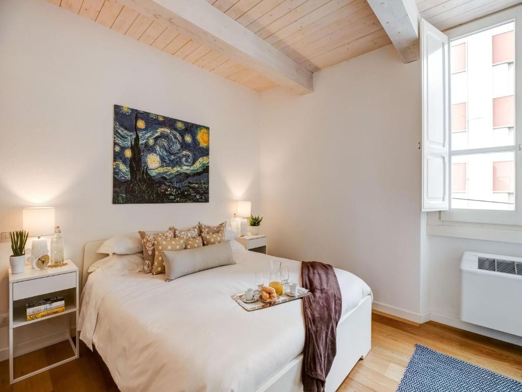 Łóżko lub łóżka w pokoju w obiekcie Apartment in Cagliari near Central Station