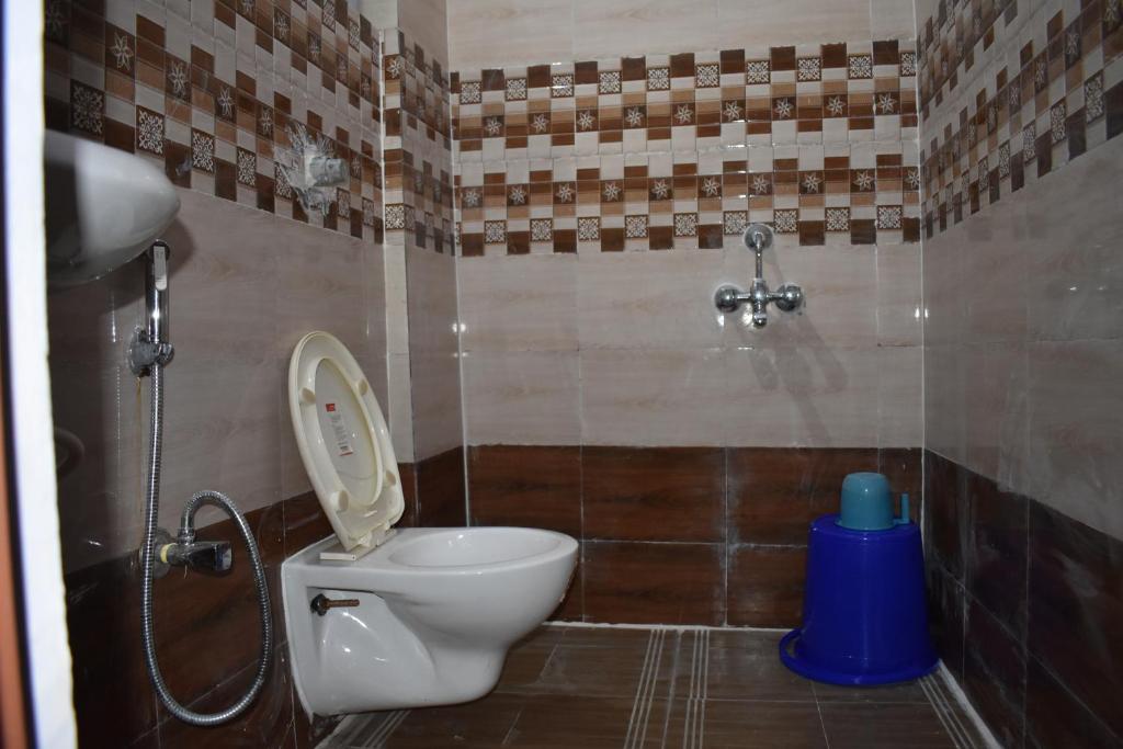 Koupelna v ubytování HOTEL PURI GREENS