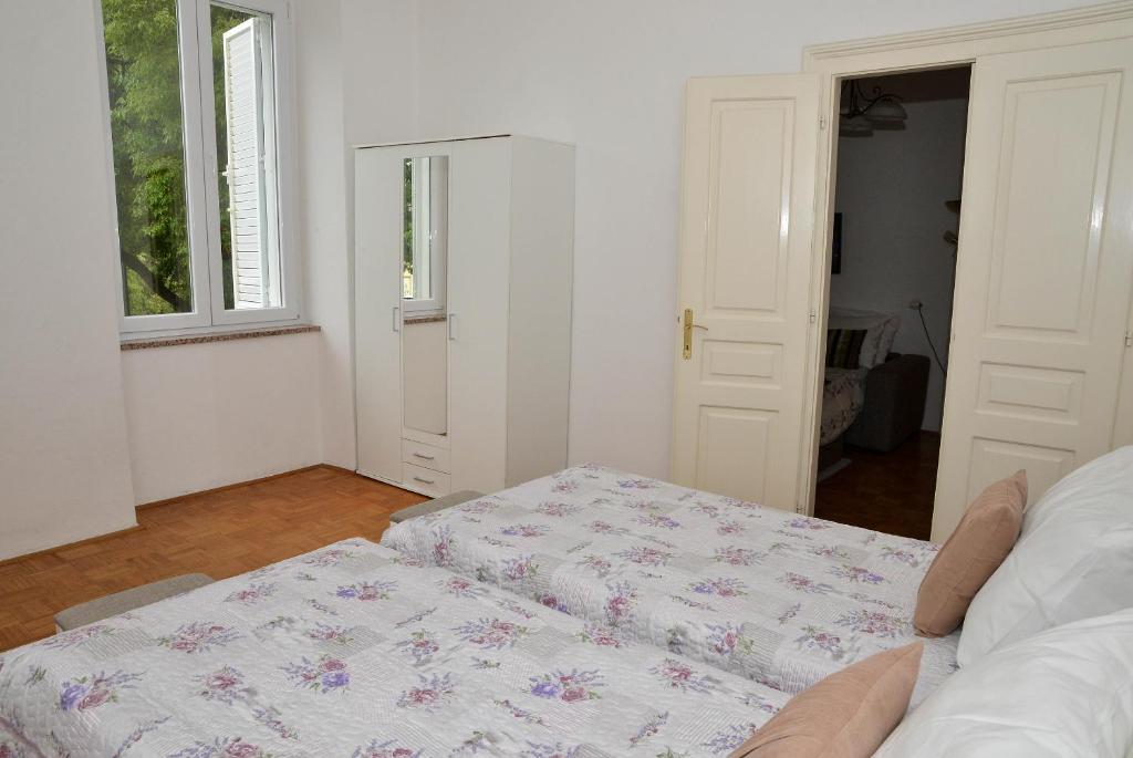 Posteľ alebo postele v izbe v ubytovaní Apartment Škunca