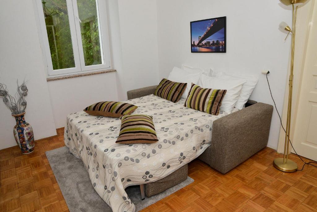 Posteľ alebo postele v izbe v ubytovaní Apartment Škunca