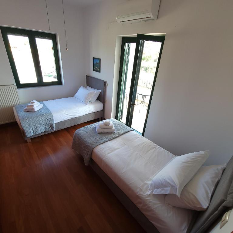 Postel nebo postele na pokoji v ubytování Paradisos Villa - Chania, Crete