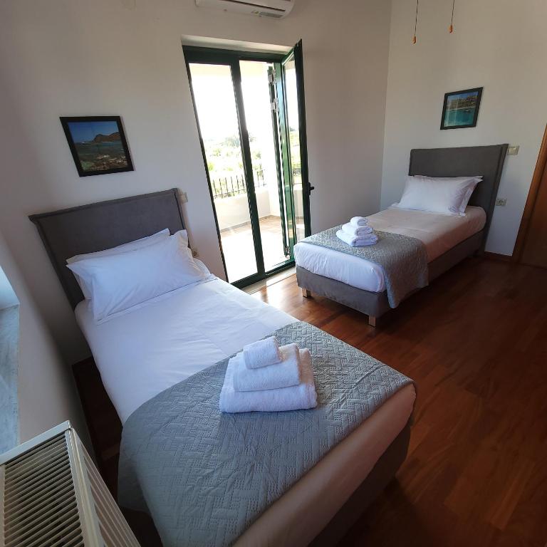 Postel nebo postele na pokoji v ubytování Paradisos Villa - Chania, Crete